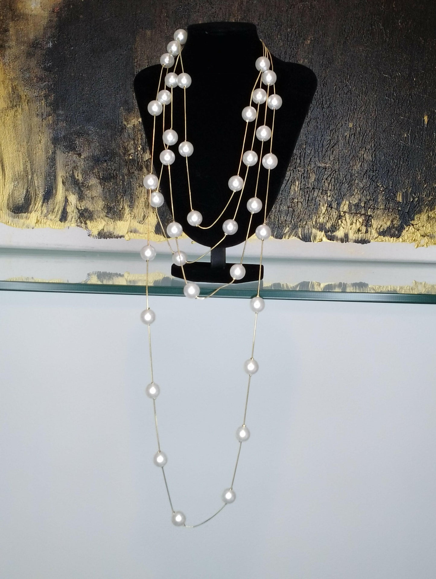 Collier Emma sautoir acier inoxydable doré 4 chaînes perlées, vue de face - collier luxueux longueurs différentes 46cm + 5cm réglage pour occasions formelles et informelles