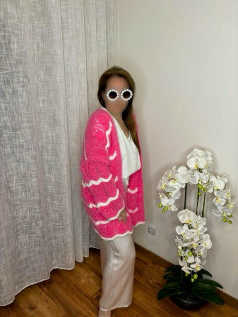Gilet fantaisie tout doux à rayures Proposer en plusieurs coloris : noir, corail, beige, crème, rose Ce produit ne se boutonne pas Taille unique Composition : 50% polyamide, 50% acrylique