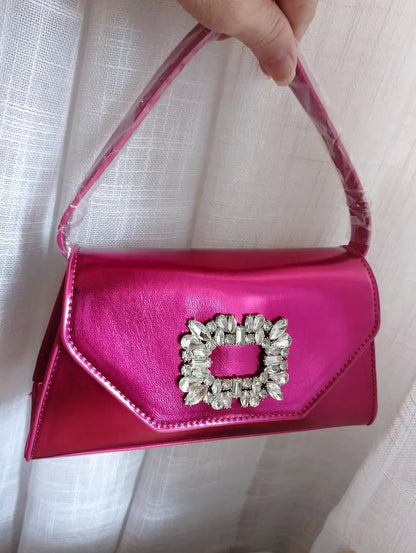 Sac Nolie BONITALUZ fuchsia porté épaule - chaîne dorée amovible