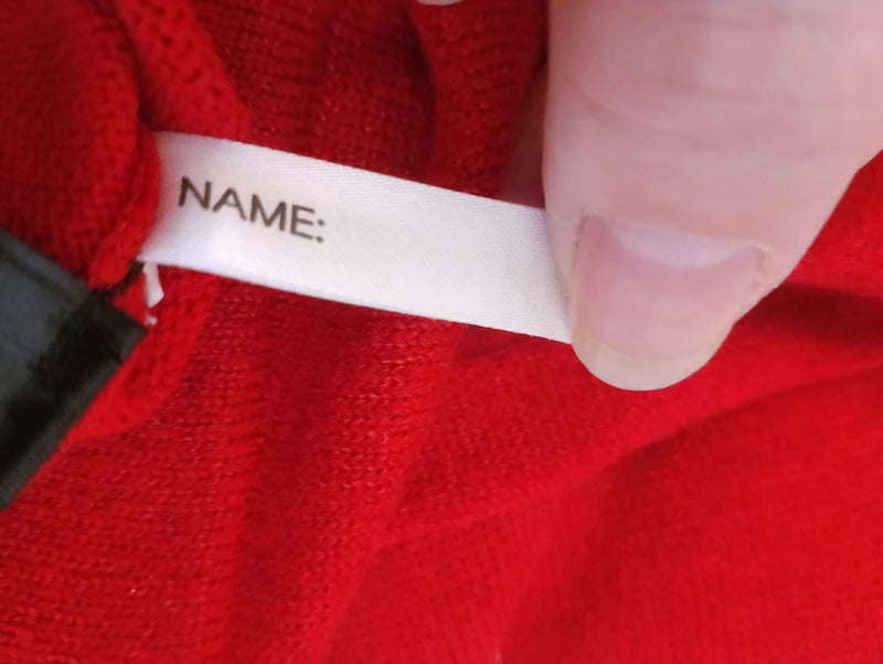 Étiquette intérieure robe rouge H&M – NAME – Seconde Vie BONITALUZ