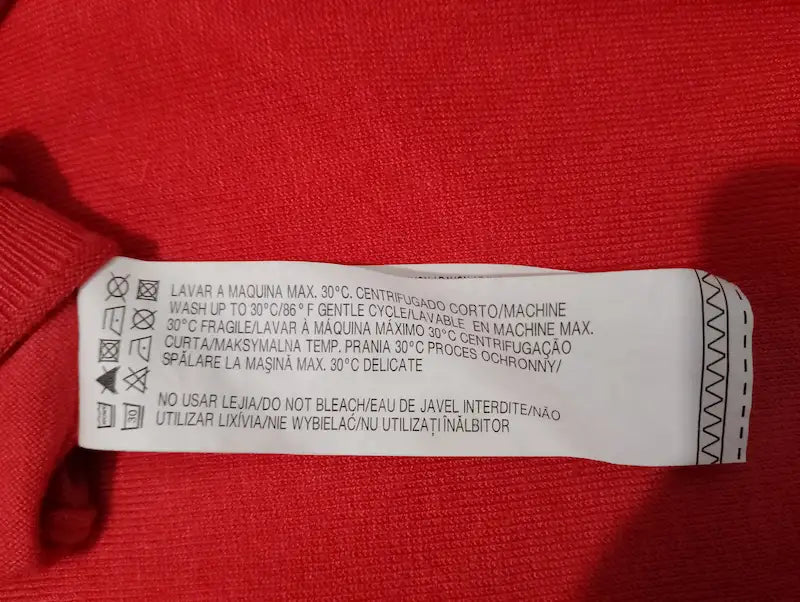 Étiquette entretien pull rose fuchsia – lavage 30°C délicat